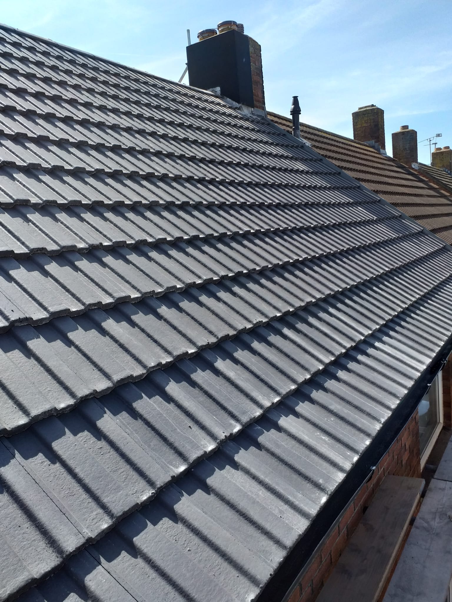 grey roof installation finished